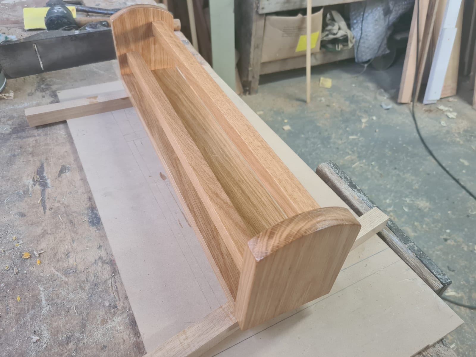 A solid timber joinery piece on the workshop bench